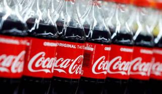 Coca-Cola boosts sales forecast as global demand rises