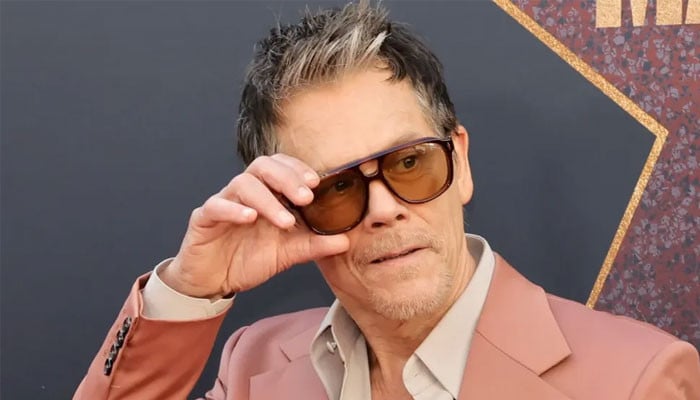 Kevin Bacon loves being famous after spending the day as a common man