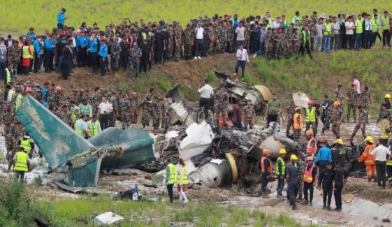 Plane carrying 19 crashes in Nepal after slipping off runway