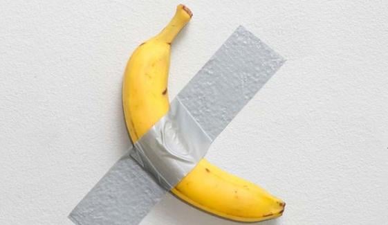 ‘Comedian,’ banana taped to wall, sells for $6.2 million at art auction in New York