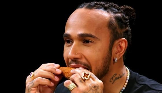 Lewis Hamilton fears weight gain after gorging on 3 pizzas a week