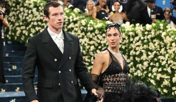 Dua Lipa, Callum Turner make PDA-filled red-carpet debut at Met Gala 2025