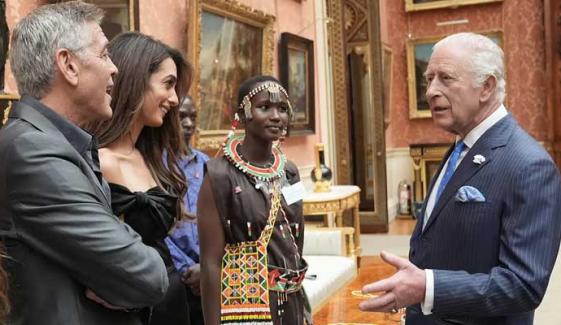 King Charles chit-chats with George, Amal Clooney at Royal Reception