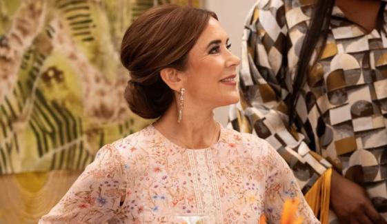 Queen Mary turns heads in mesmerising peach gown at special dinner in Nigeria