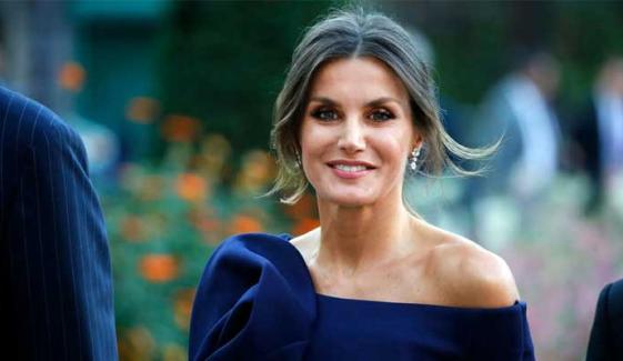 Queen Letizia revives stunning peacock dress at Seville dinner
