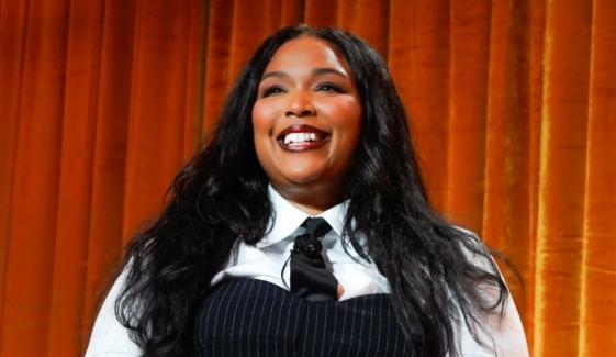 Lizzo promotes her brand in perfect summer style with iconic film dialogue