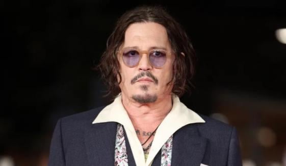 Johnny Depp thanks his abusive mom for lesson in parenting