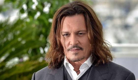 Johnny Depp gives touching nod to ex-wife at London art exhibition