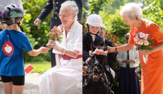 Queen Margrethe, Princess Benedikte greet young riders at Gråsten castle