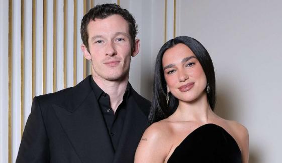 Dua Lipa sizzles in summer fit as enjoying getaway with Callum Turner