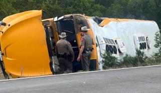 School bus with 43 onboard overturns in Texas, injuring 10