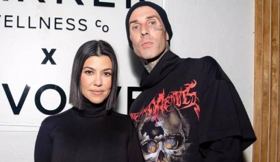 Kourtney Kardashian drops photo dump with Travis Barker from family vacay