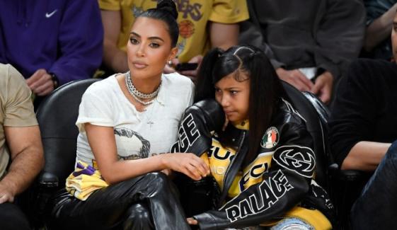 North West towers over mom Kim Kardashian in 5-inch platform boots in Rome