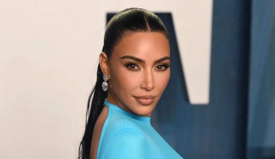 Kim Kardashian flaunts hourglass figure in slinky gown at DVF Awards