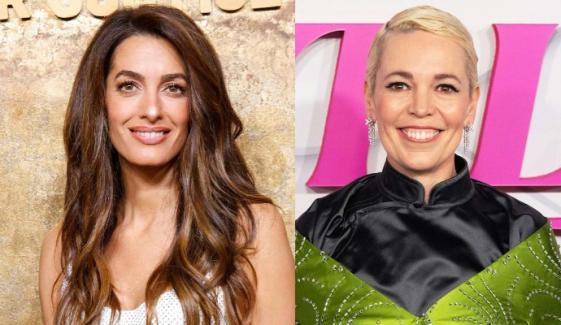 Amal Clooney, Olivia Colman walk rain-soaked red carpets in Venice and London