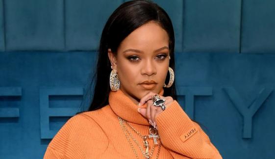 Rihanna marks 20 years since debut with emotional note, R20 merch drop