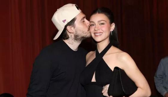 Brooklyn Beckham slammed for risking safety to blow kiss to wife while riding