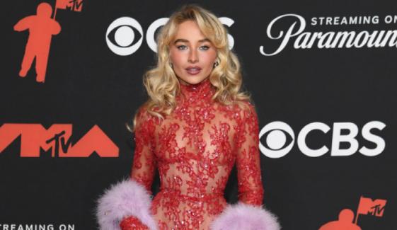 Sabrina Carpenter brings old Hollywood glam to 2025 VMAs in sheer red gown
