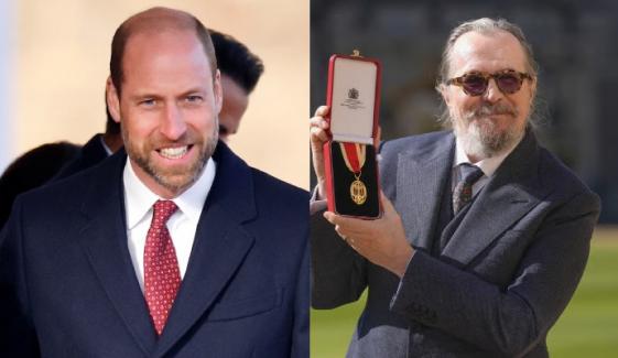 Prince William knights Oscar winner Gary Oldman at Windsor Castle