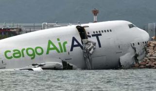 Cargo plane crashes into sea at Hong Kong airport after sliding off runway