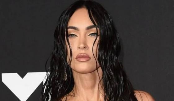 Megan Fox chokes back tears recounting paparazzi scrutiny