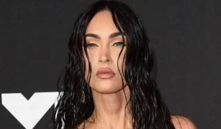 Megan Fox chokes back tears recounting paparazzi scrutiny