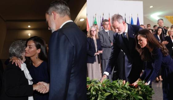 King Felipe, Queen Letizia lead tribute amid public scrutiny