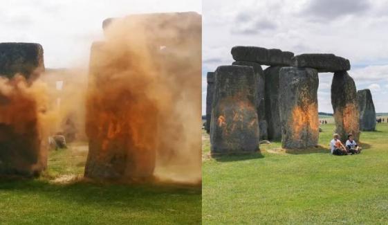 Stonehenge protesters acquitted after spraying orange powder at iconic site