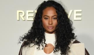 Travis Kelce's ex mocks Taylor Swift's relationship with Halloween look: 'real showgirl'