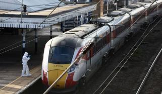 Two suspects arrested after stabbing attack on train near Cambridge in UK