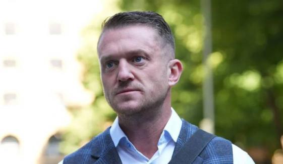 Tommy Robinson cleared of terrorism-related charge over phone refusal