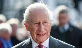 King Charles cracks cheeky joke about his broken arm at key veterans meeting