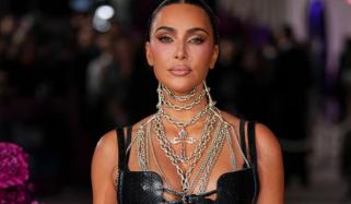 Kim Kardashian turns heads in completely sheer lace outfit