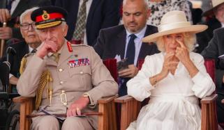King Charles, Queen Camilla overcome with emotion at solemn ceremony
