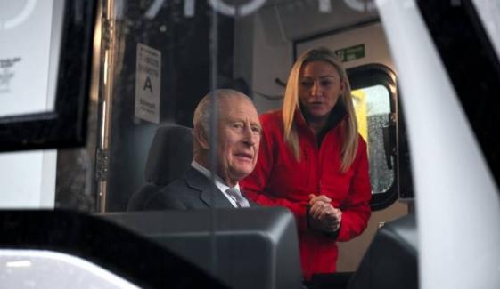 King Charles vibes to ‘She’s Electric’ as he drives Wales metro on 77th birthday