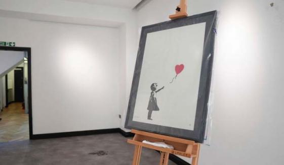 Banksy thief gets 13-month sentence for 'girl with balloon' heist