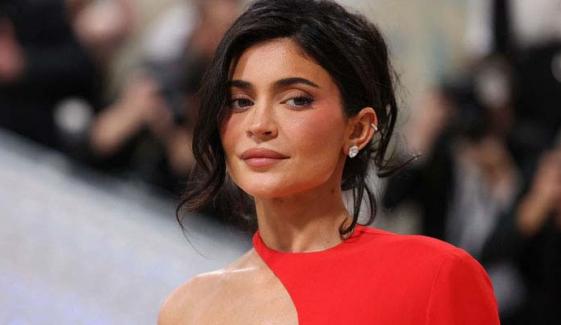 Kylie Jenner stuns fans in plunging black dress for Thanksgiving celebration