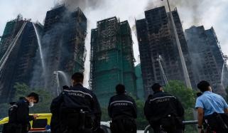 Anger in Hong Kong over cause of fire as death toll rises to 128