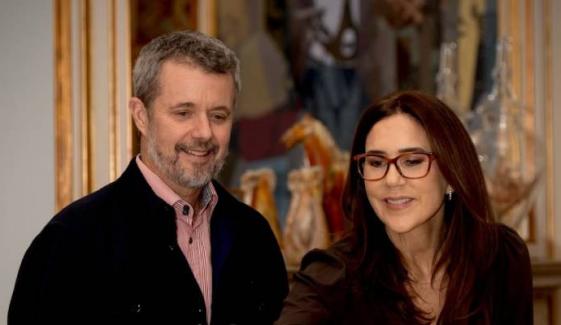 Queen Mary, King Frederik light Advent Sunday candles with love and warmth