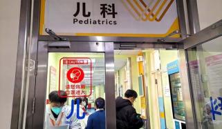 China reports major flu surge in 17 provincial regions