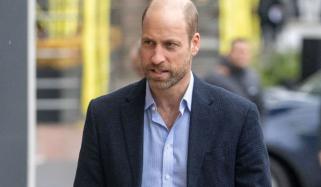 Prince William beams as he cuts giant cake for key celebration