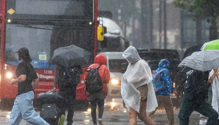 UK braces for 'danger to life' weather as met office issues heavy rain ...