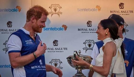 Meghan Markle cheers Prince Harry as he competes in World Snow Polo Championship