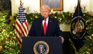 Trump blames immigrants for economic woes, gives troops 'warrior dividend'