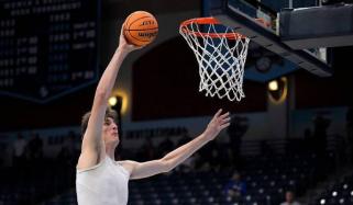 World’s tallest college basketball player Olivier Rioux breaks records with historic dunk