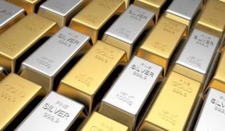 Prices of gold and silver hit record highs amid economic uncertainty