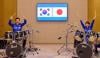 South Korea, Japan's leaders perform K-pop drum duet after diplomatic talks