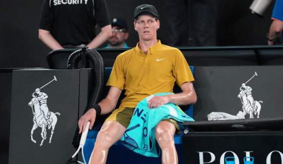 Sinner survives extreme conditions to keep Australian Open defense alive