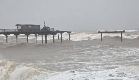 Teignmouth Grand Pier partly destroyed amid severe Storm Ingrid