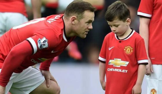 Wayne Rooney beams with pride as son Kai make Old Trafford debut